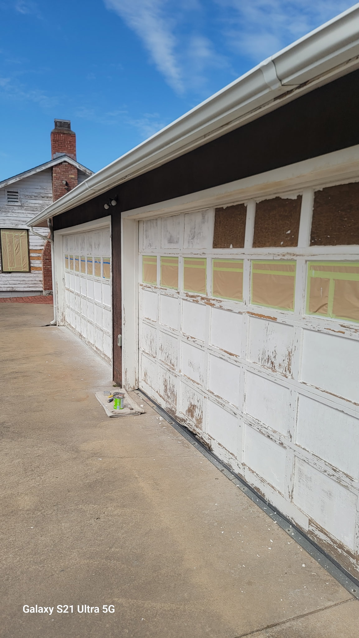 Garage doors before painting Stillwater OK