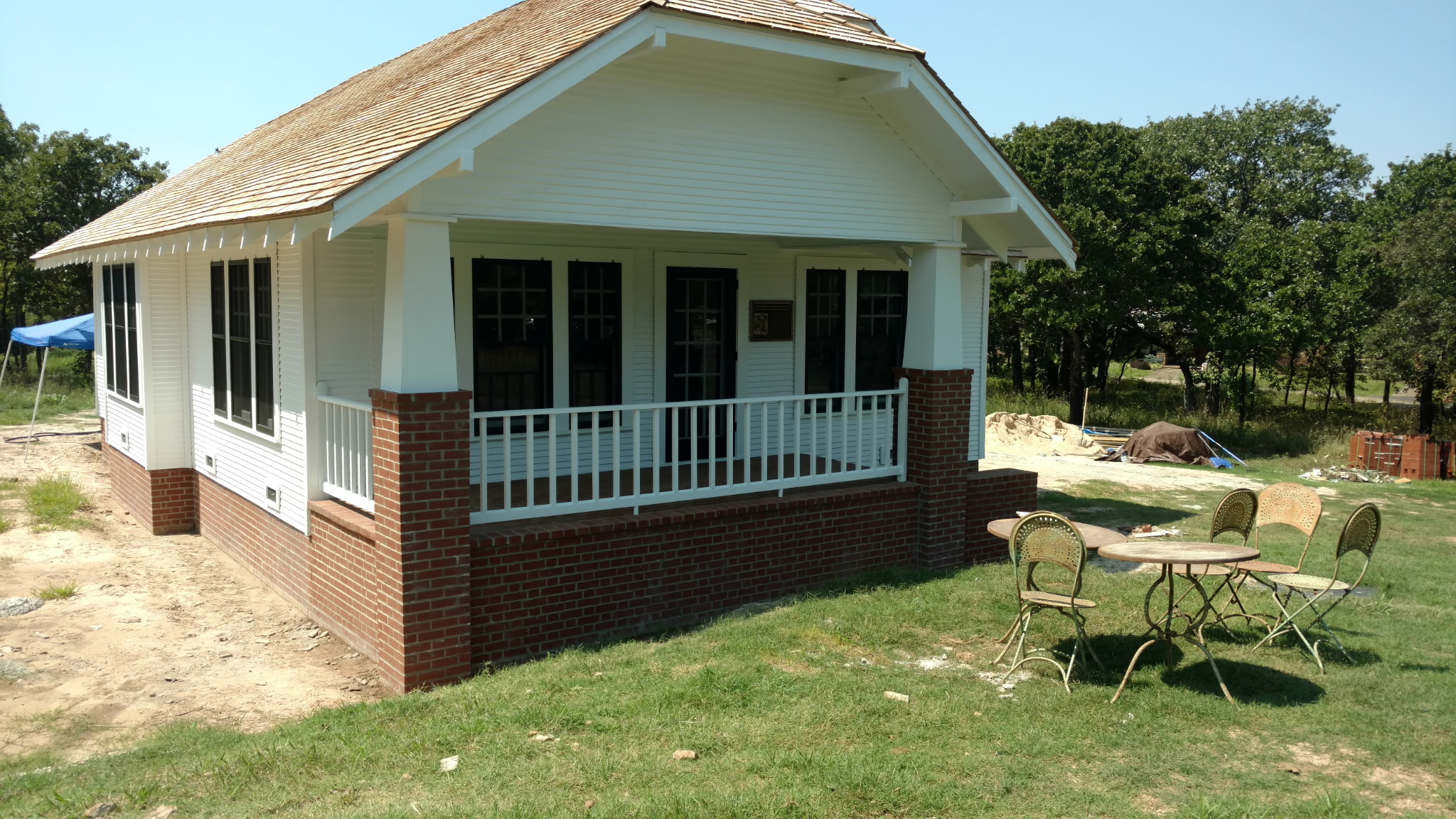 T. Boone Pickens childhood home exterior after restoration and painting by Dawgone Custom Painting, Stillwater OK